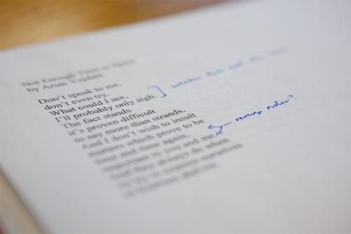GW English Creative Writing photo: a sheet of paper with a poem written on it